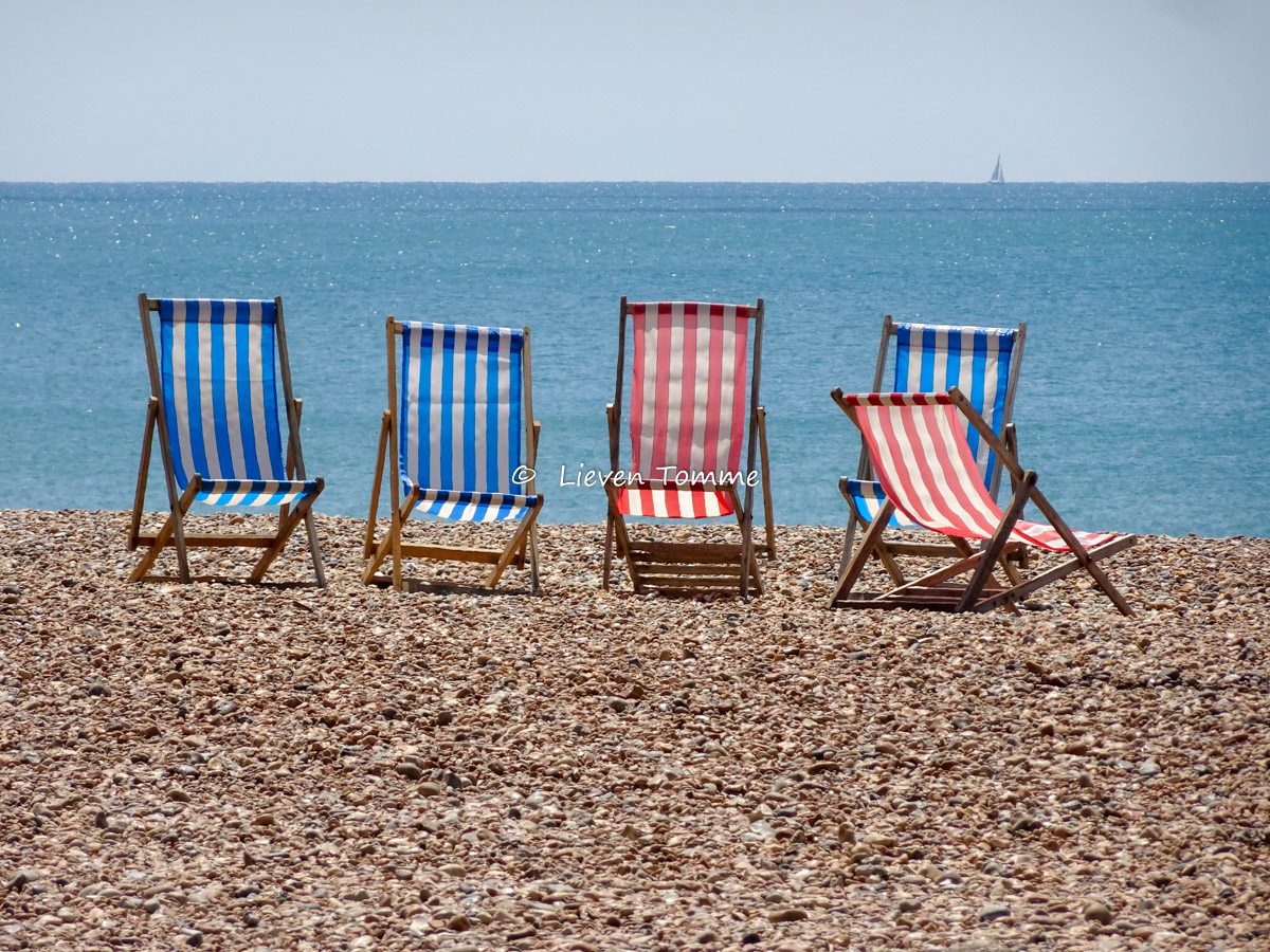 Beach chairs on a shingle