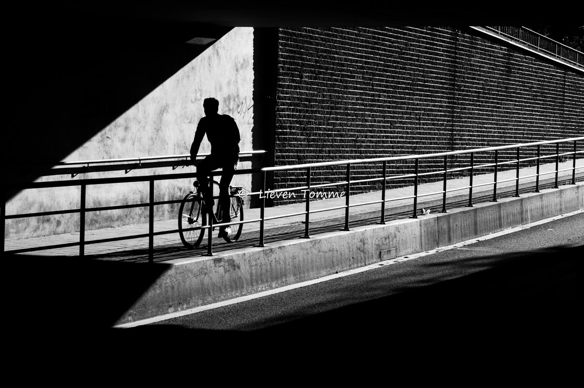 Cyclist entering a tunnel
